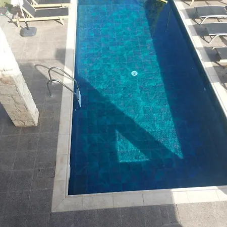 Angela Villa Dhrousha